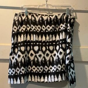 NWOT High end golf skort. Ikat design fabric. Many special details. Size 14.